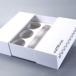 Double-sided sliding rigid boxes