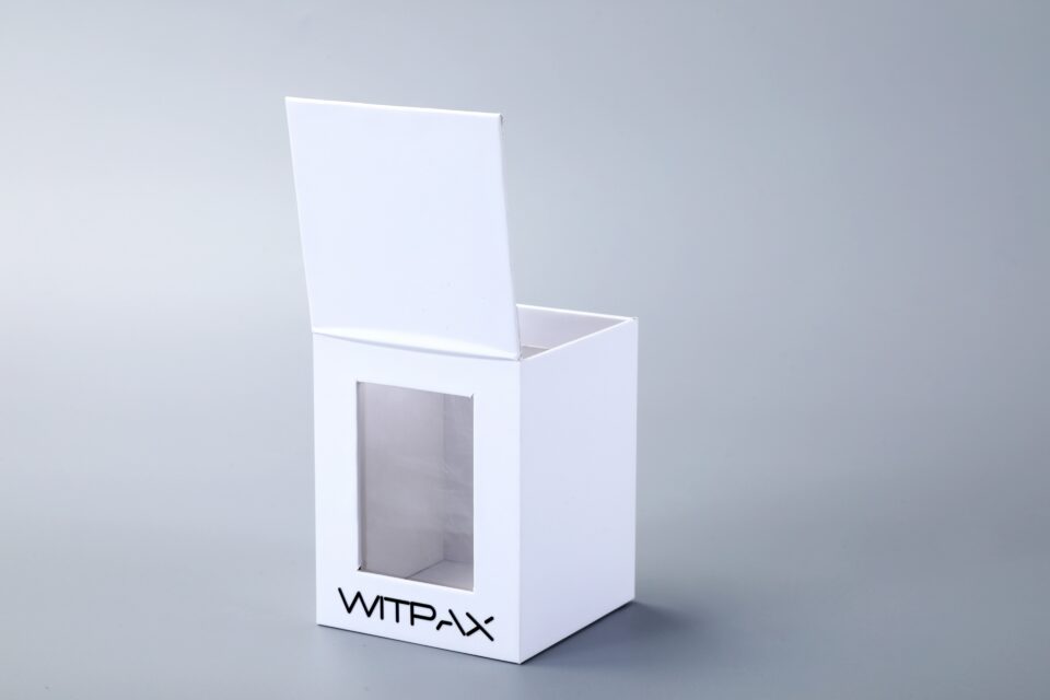 Flip-top box with window