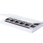 A white, rectangular rigid setup box, partially opened, featuring six die-cut compartments designed for securely holding items. The box is presented with a transparent background.