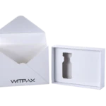 an open custom White packaging box, specifically designed with a fitted insert to securely hold a small bottle or vial.