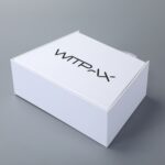 Trapezoidal book-style rigid box with straps