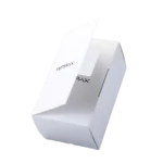 The image displays a white custom cardboard box partially open, showcasing the folded lid flap.