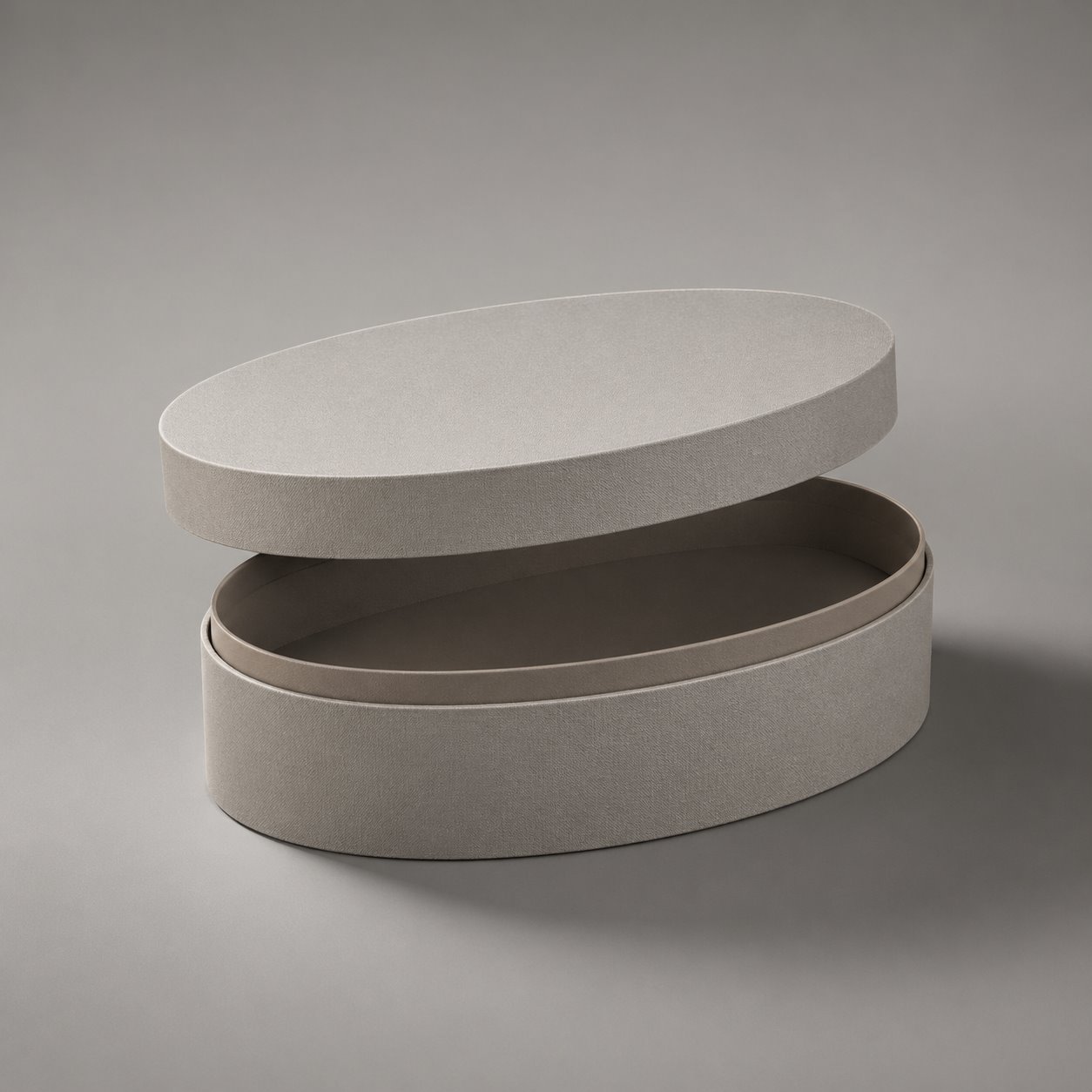 Oval portable lift-off lid gift box packaging feature image showing Distinctive Form: Hand-Finished Curved Walls