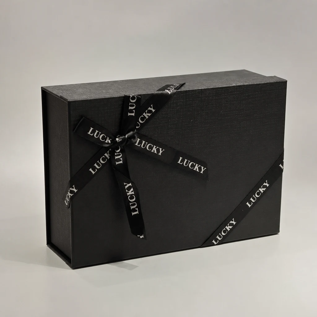Custom dark lift-off lid box with ribbon packaging box front angle