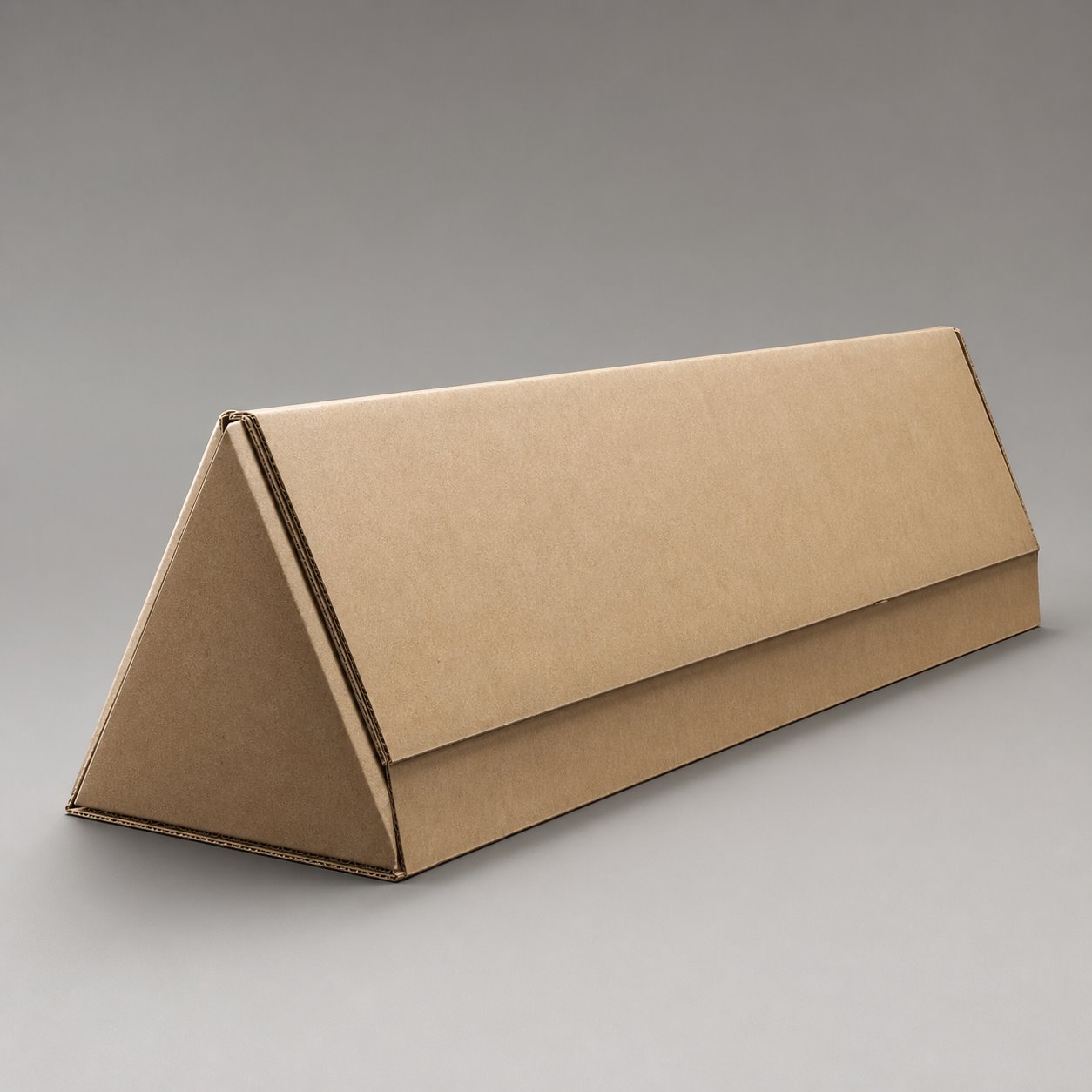 Triangular prism corrugated box packaging feature image showing Unbendable Form: Unique Postal Experience
