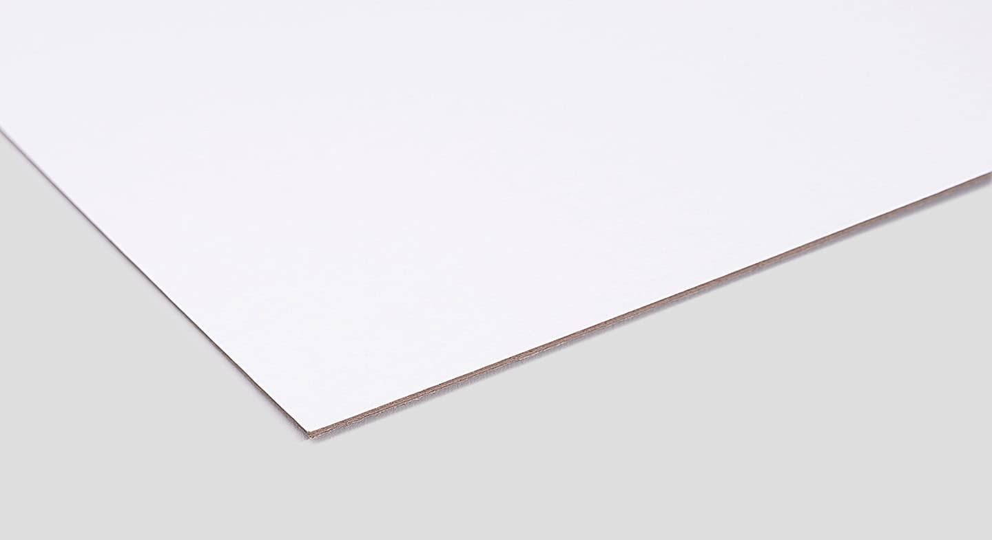 A sheet of white duplex chipboard, showcasing a smooth, flat surface with a slight sheen, placed on a light gray background.
