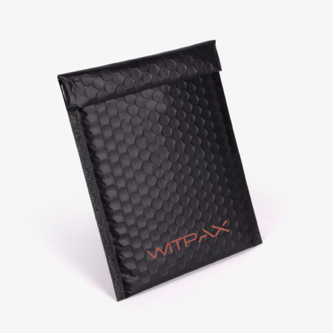 Front view of custom black bubble mailer box with honeycomb texture and WITPAX branding