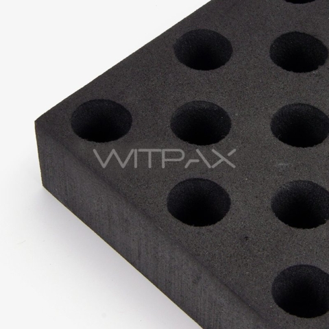 Black foam box insert with multiple circular cutouts showing detailed view of precision-cut holes and Witpax branding