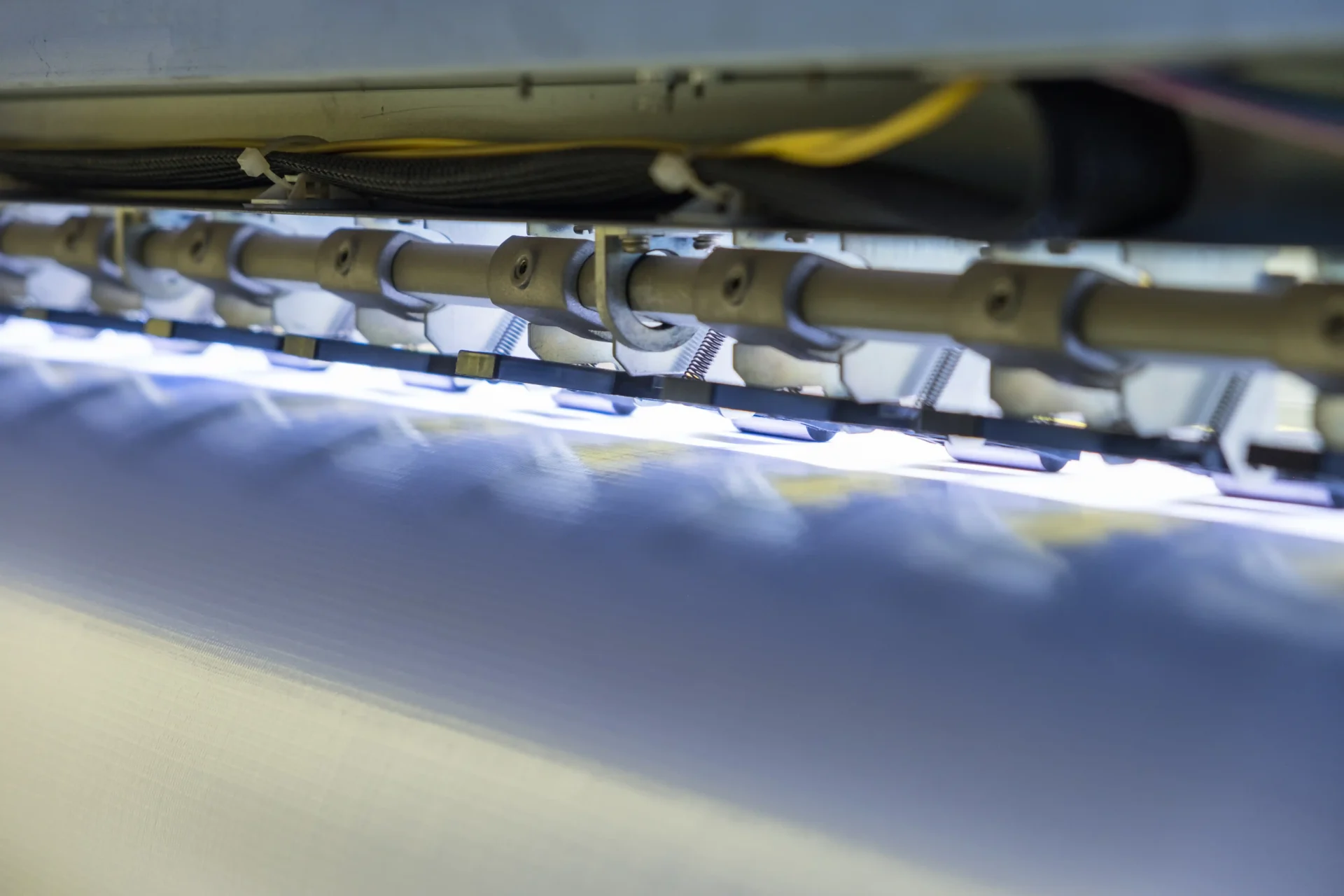 Close Up Rear Large Inkjet Printer Working On Viny