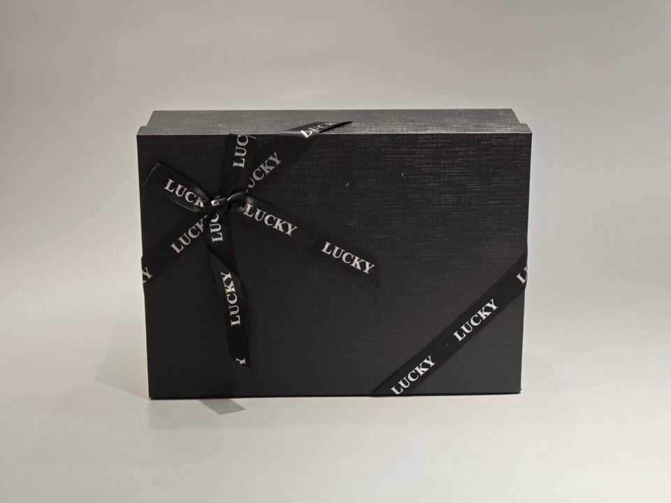 custom dark lift-off lid box with ribbon