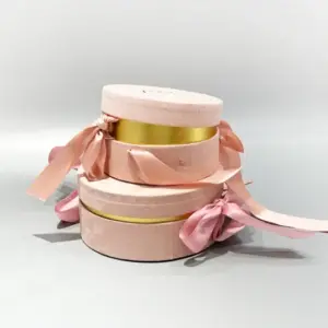 Custom round shaped gift boxes with ribbon