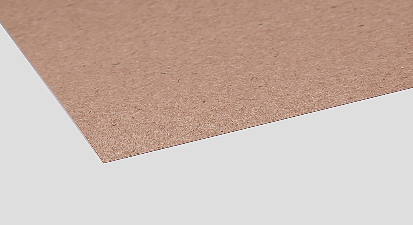 A close-up of brwon grass textured paper, showcasing a natural, fibrous pattern on a light gray surface.