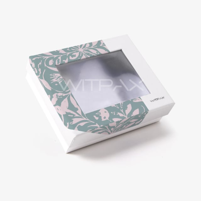 Custom rigid box with floral print and clear window shown closed at an angle
