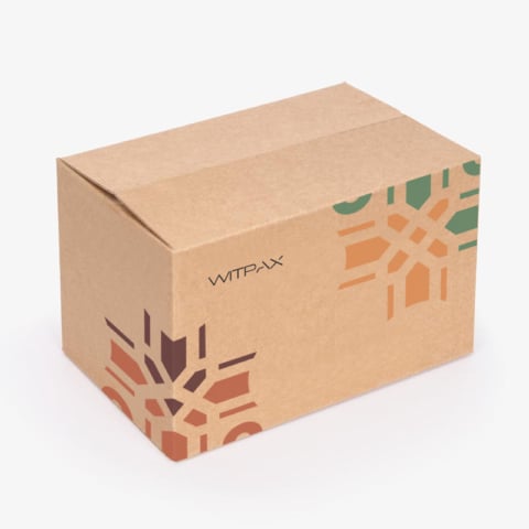 Closed kraft mailer box with colorful geometric pattern and WITPAX branding on natural background
