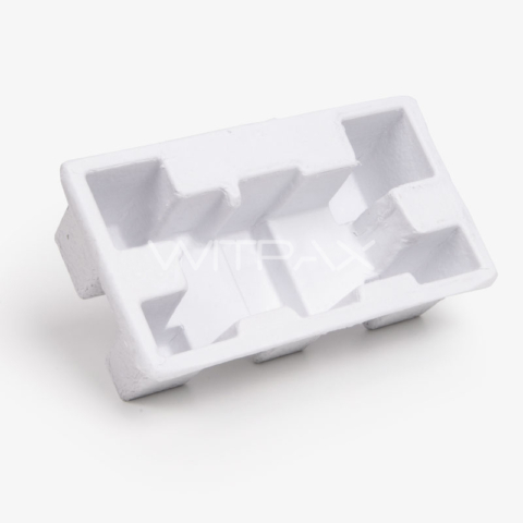 Angled view of white molded pulp box insert showing multiple compartments and cavities