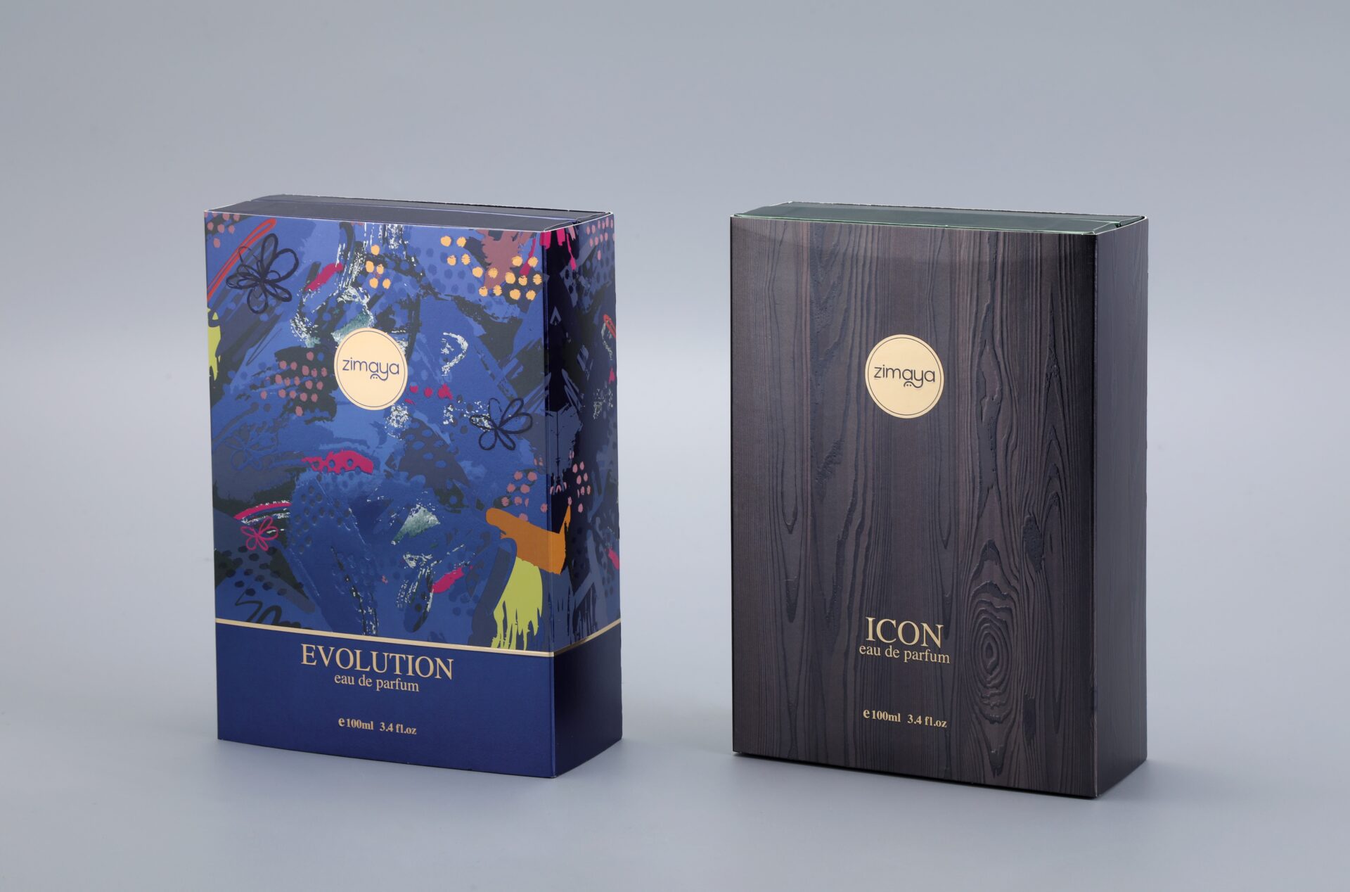 Our product showcases two distinctive custom box packaging designs for perfumes. One features a vibrant and artistic abstract pattern, while the other exhibits an elegant wood texture finish.