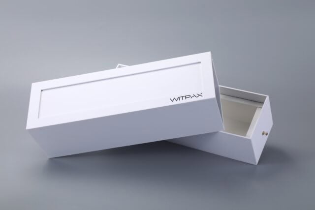 Sliding drawer rigid box placed on a gray background.