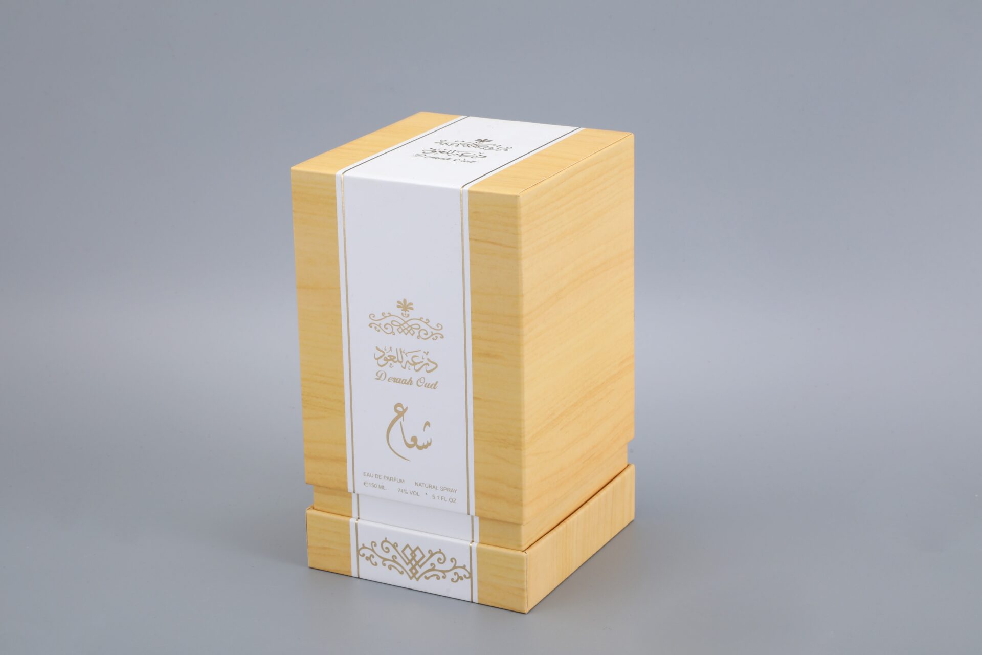 This image showcases our custom wooden texture packaging box, featuring intricate decorative patterns on a stylish white label. The box is set against a neutral gray background, highlighting its craftsmanship and design elegance.
