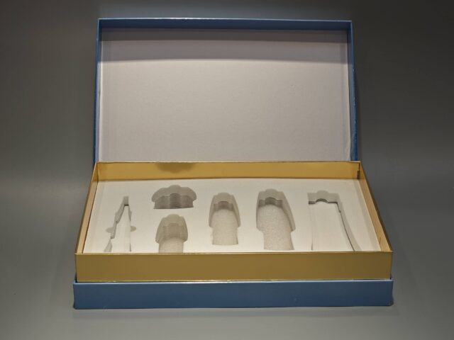 Our product is a custom box featuring intricate floral patterns in blue, designed to encapsulate the elegance and sophistication typical of high-end skincare packaging. The design reflects an attention to detail and premium quality, befitting luxurious cosmetic items.