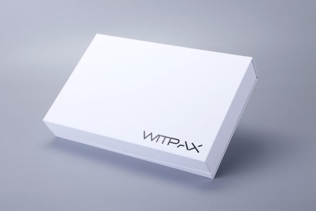White box with magnetic closure, placed against a plain gray background.