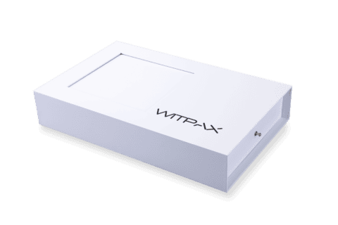White box with "WINPAX" text, featuring a pull-out drawer and window on a black background.