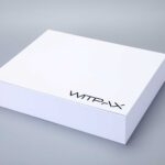 White box on a gray surface with "WITPAX" printed on the lid.
