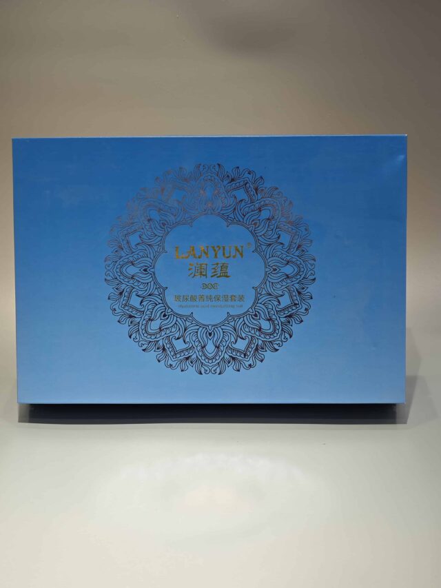 Our product is a custom box featuring intricate floral patterns in blue, designed to encapsulate the elegance and sophistication typical of high-end skincare packaging. The design reflects an attention to detail and premium quality, befitting luxurious cosmetic items.