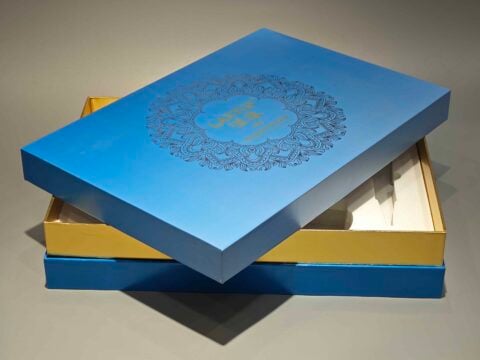 Our product is a custom box featuring intricate floral patterns in blue, designed to encapsulate the elegance and sophistication typical of high-end skincare packaging. The design reflects an attention to detail and premium quality, befitting luxurious cosmetic items.