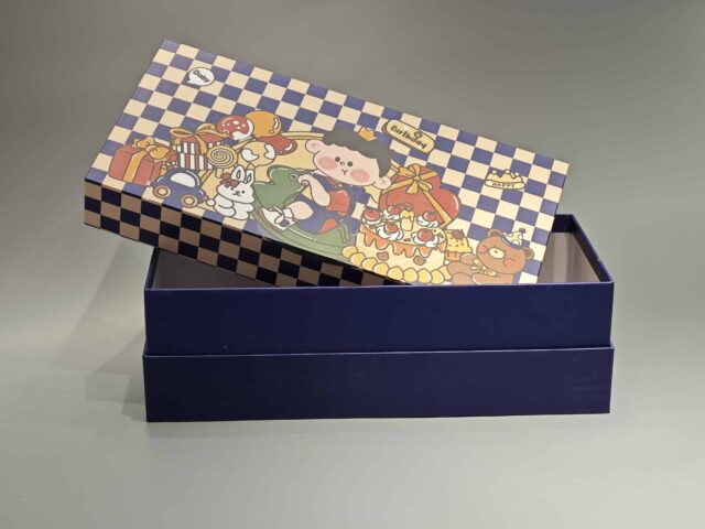This custom packaging box showcases playful cartoon characters, including a cheerful pig and a chicken, surrounded by a delightful assortment of pastries. The vibrant design is set against an imaginative checkered backdrop, creating an eye-catching presentation for any gift.