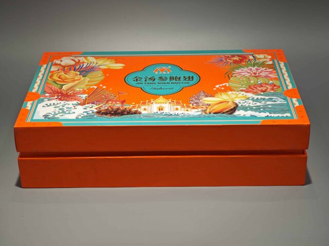 Our product is a decorative orange and teal gift box with floral and ocean-themed illustrations, perfect for custom packaging needs. The design incorporates elements of Chinese culture, adding a unique and artistic touch to your packaging solution.