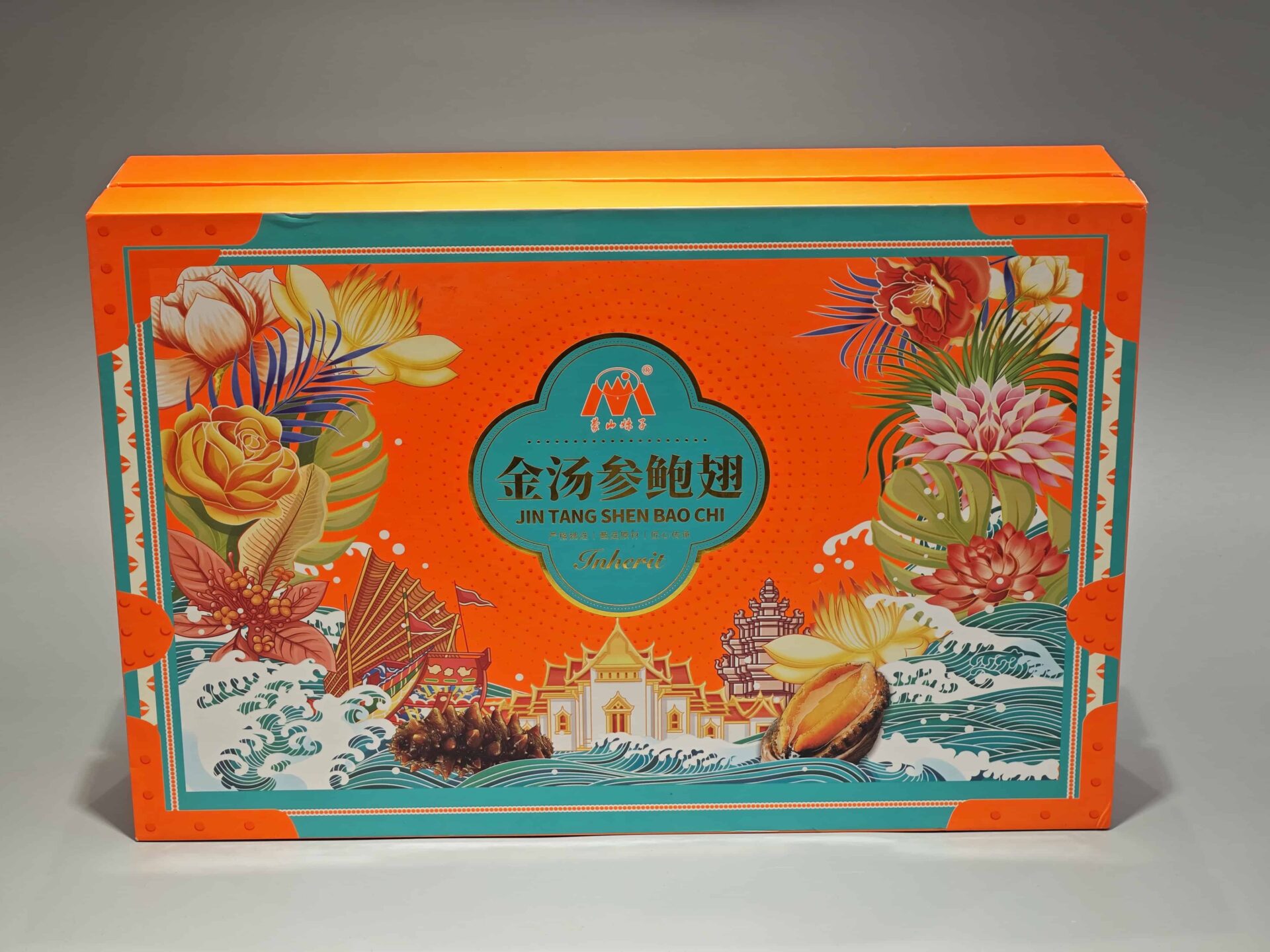 Our product is a decorative orange and teal gift box with floral and ocean-themed illustrations, perfect for custom packaging needs. The design incorporates elements of Chinese culture, adding a unique and artistic touch to your packaging solution.